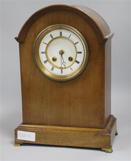 A mahogany mantel clock